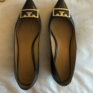 Tory Burch black wedge heel dress shoes with gold logo.  Sexy